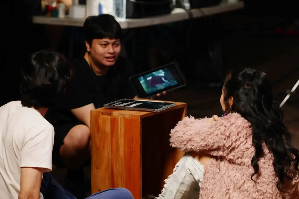 director at production house briefing talent