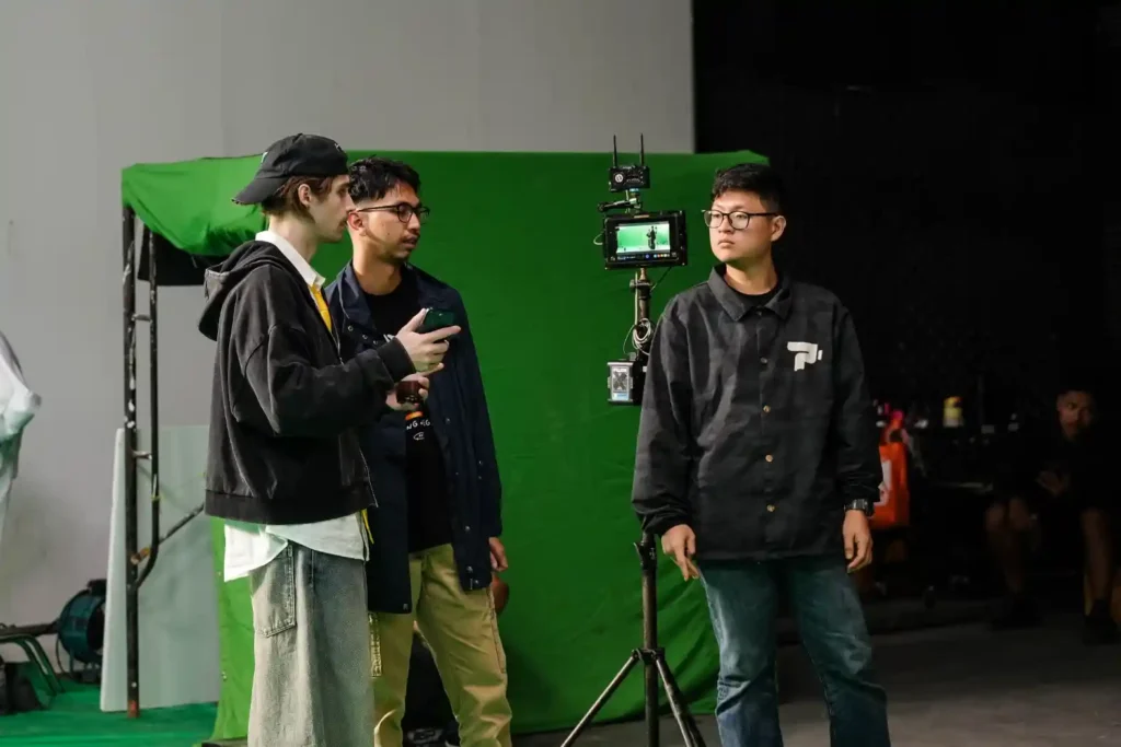 director briefing the talent on a film set