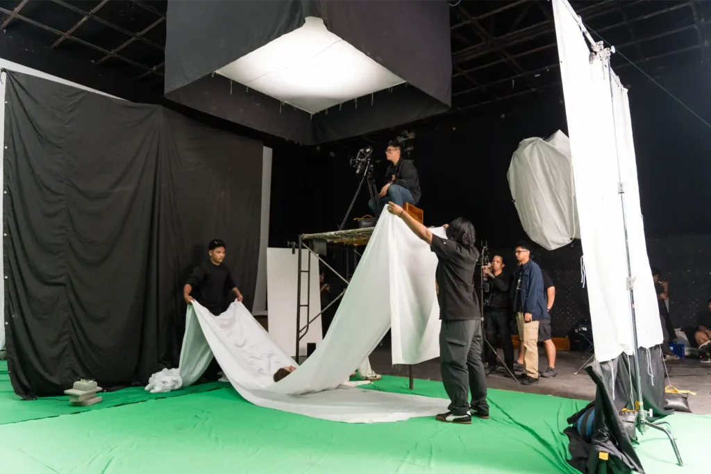 production house studio with people doing film shoot