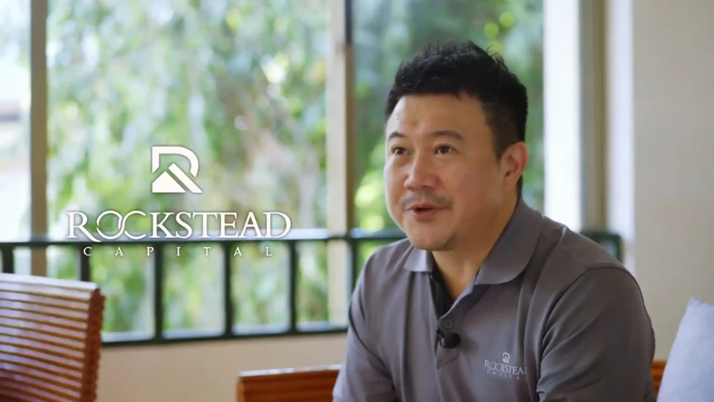 Rockstead Capital corporate interview video featuring an executive speaking in a professional office environment