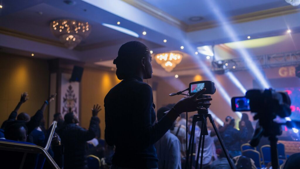 a person taking a picture with a camera